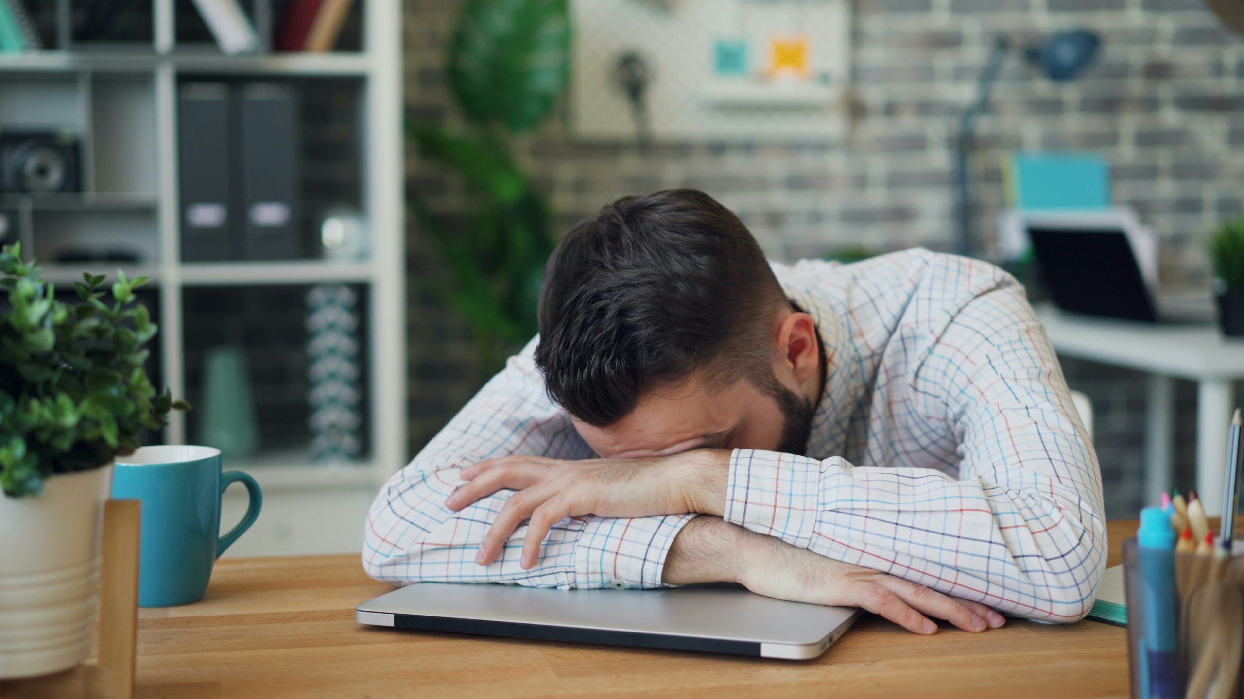 burnt out man at desk